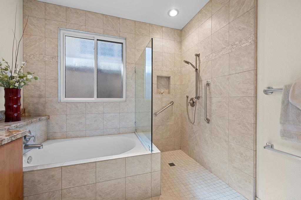 1827 Amalfi Drive Encinitas, CA 92024 - Photo 24 of 31 a bathroom with a bathtub and shower