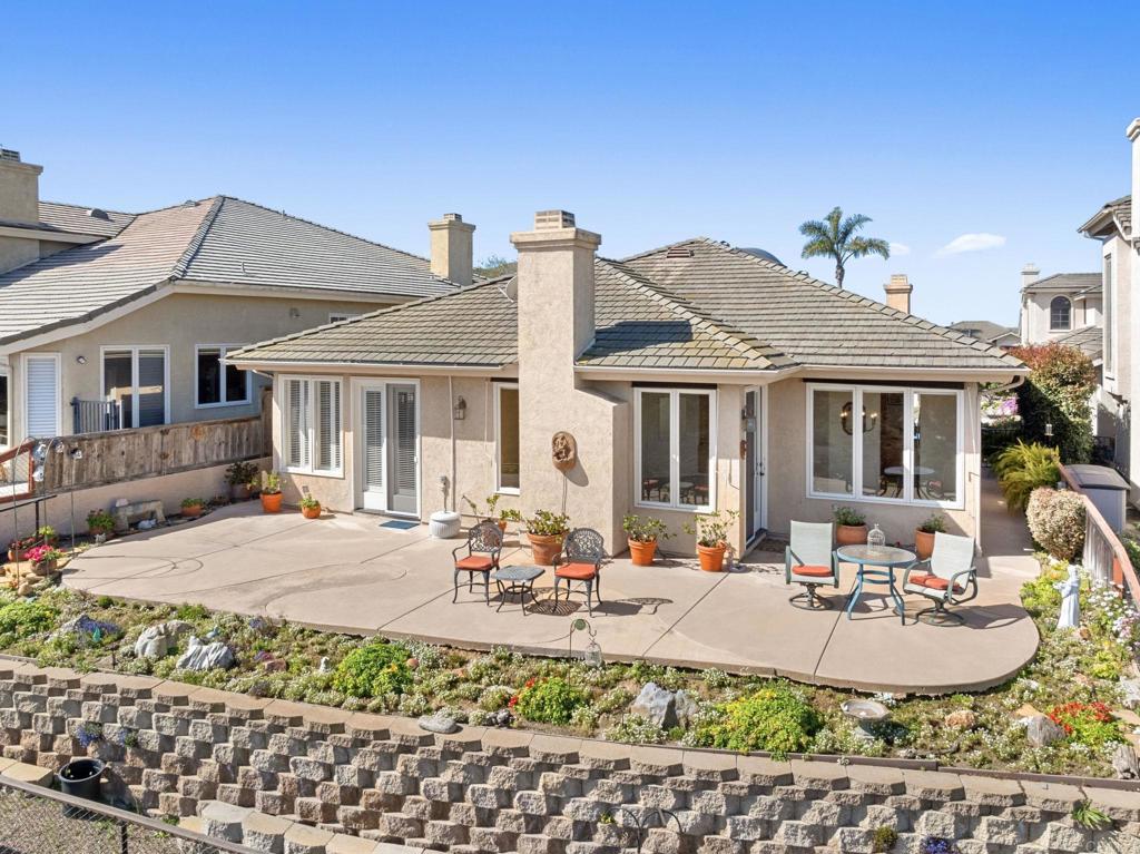 1827 Amalfi Drive Encinitas, CA 92024 - Photo 28 of 31 a view of a white house with a outdoor space