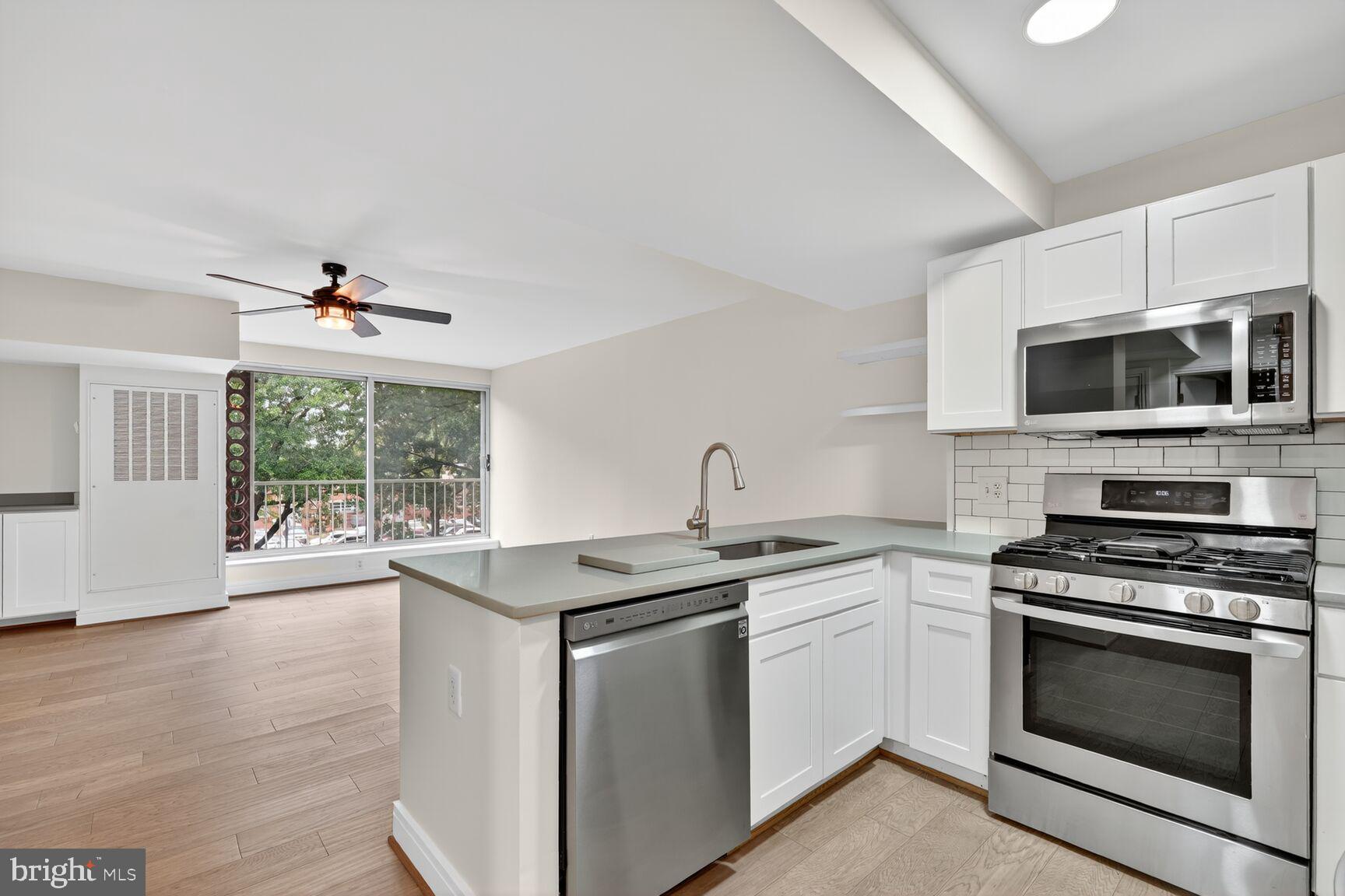 800 4th Street Southwest, Unit S221 Washington, DC 20024 - Photo 5 of 12 Modern kitchen with natural light.