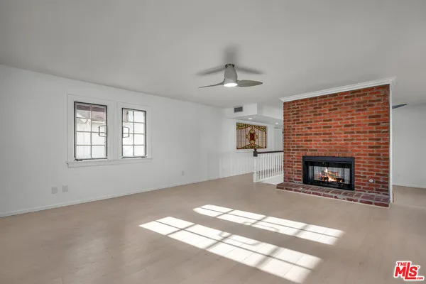 a living room with a fireplace