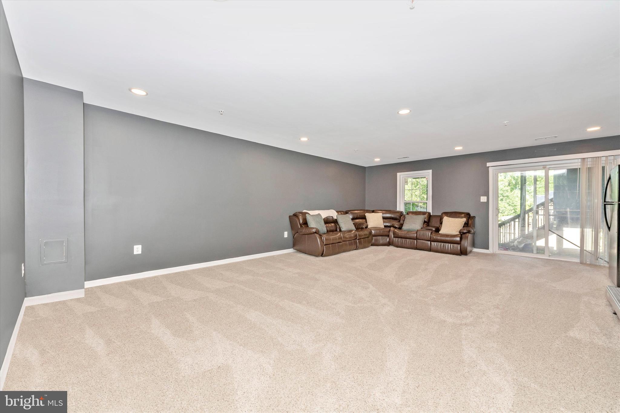 202 Timber View Court Frederick, MD 21702 - Photo 21 of 31 Spacious lower level family room with walk out.