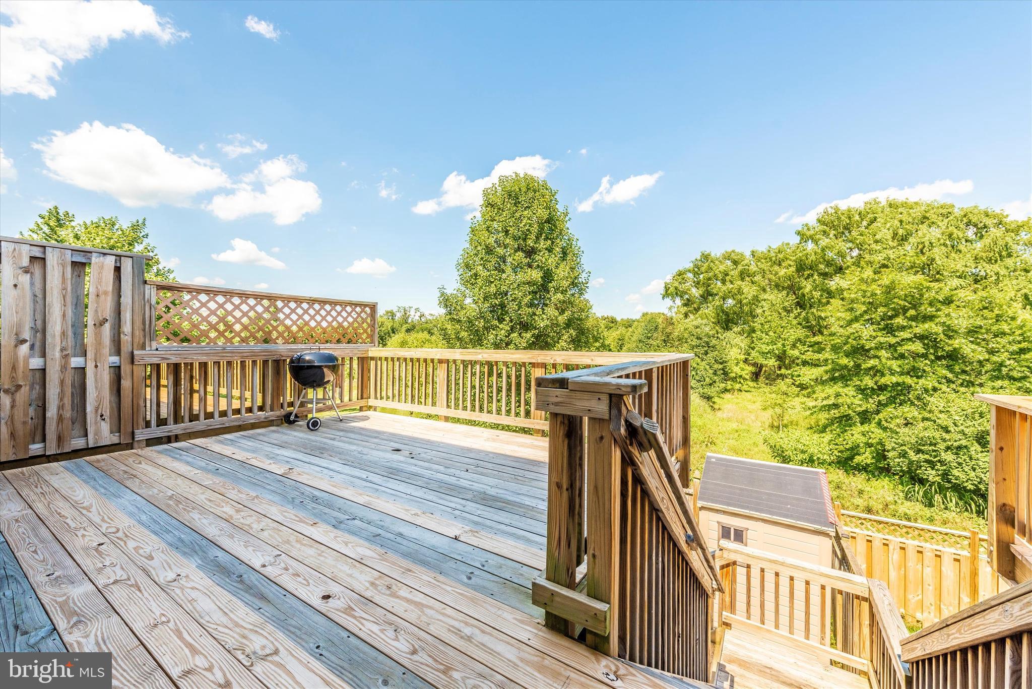 202 Timber View Court Frederick, MD 21702 - Photo 26 of 31 Spacious upper level rear deck with great views.