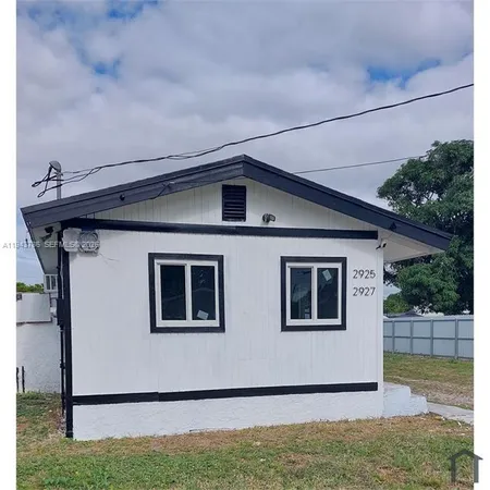 a front view of house with yard
