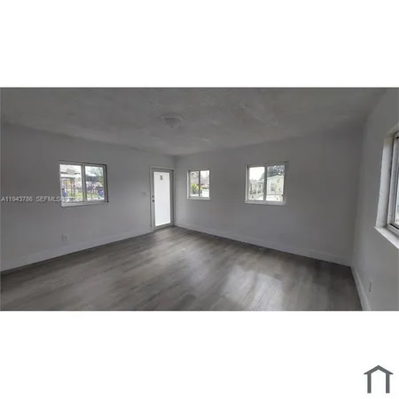 a upper view of a living room and window