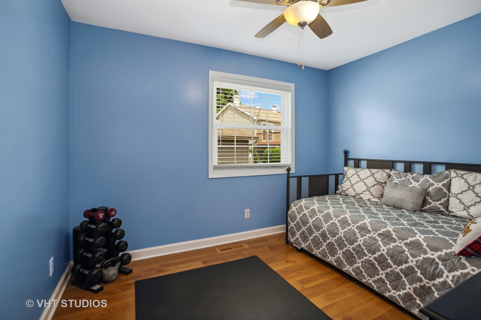 7 Windsor Court Streamwood, IL 60107 - Photo 16 of 22 a bedroom with a bed and a window