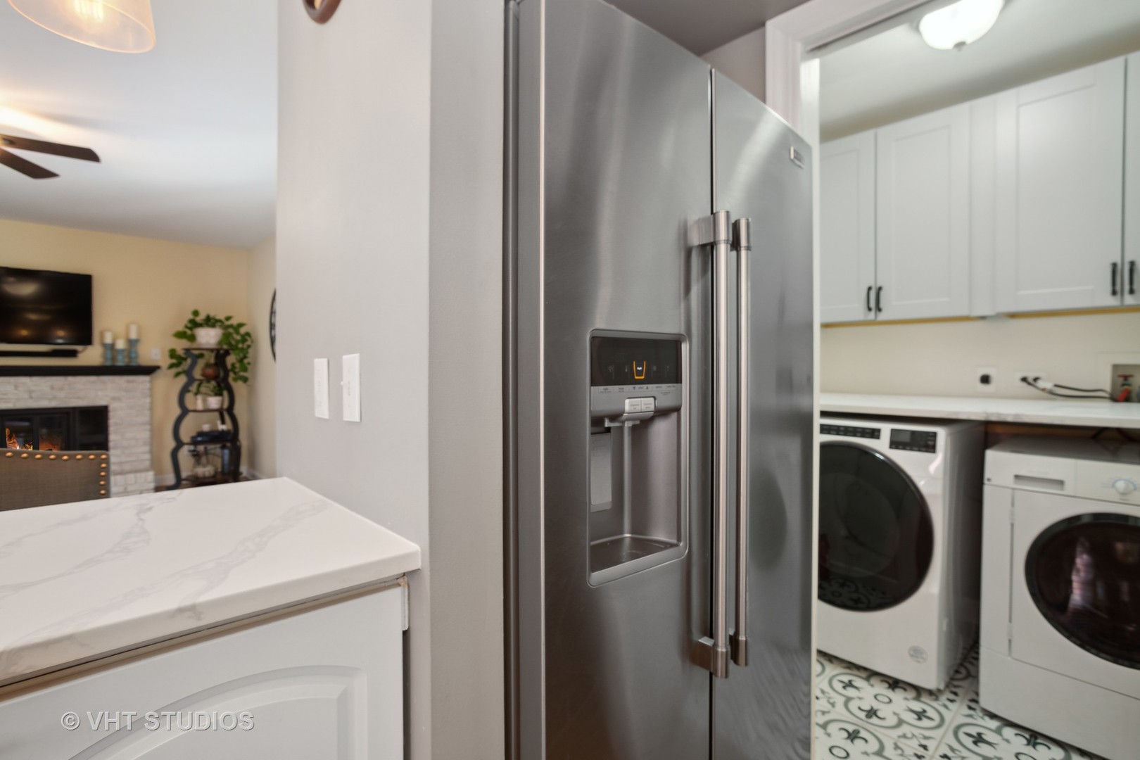 7 Windsor Court Streamwood, IL 60107 - Photo 19 of 22 a view of a kitchen with washer and dryer