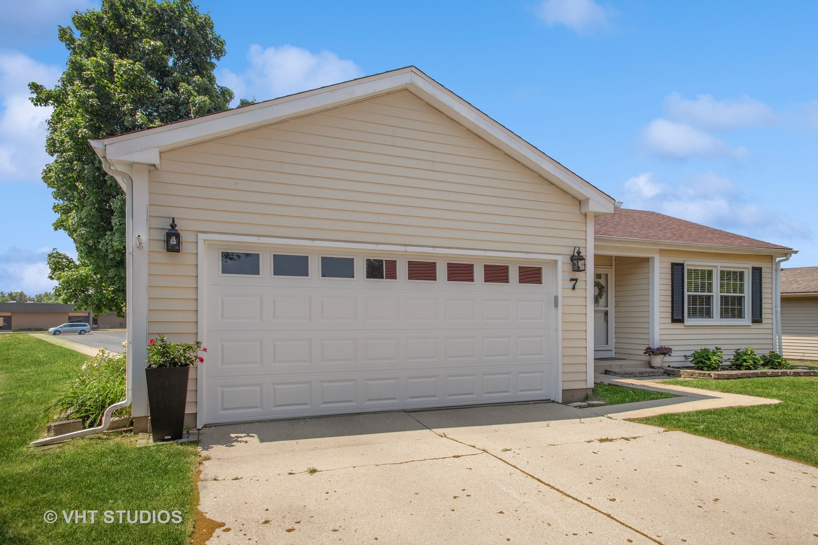 7 Windsor Court Streamwood, IL 60107 - Photo 2 of 22 a view of backyard of the house