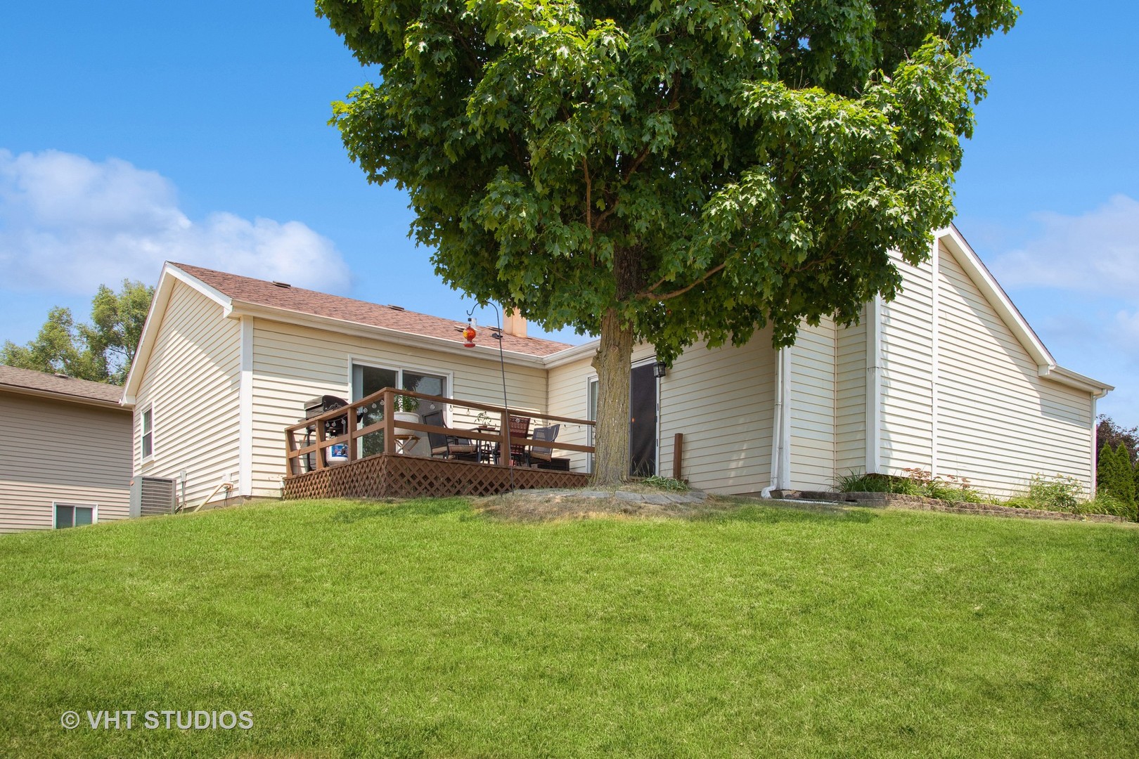 7 Windsor Court Streamwood, IL 60107 - Photo 22 of 22 a front view of house with yard and trees all around
