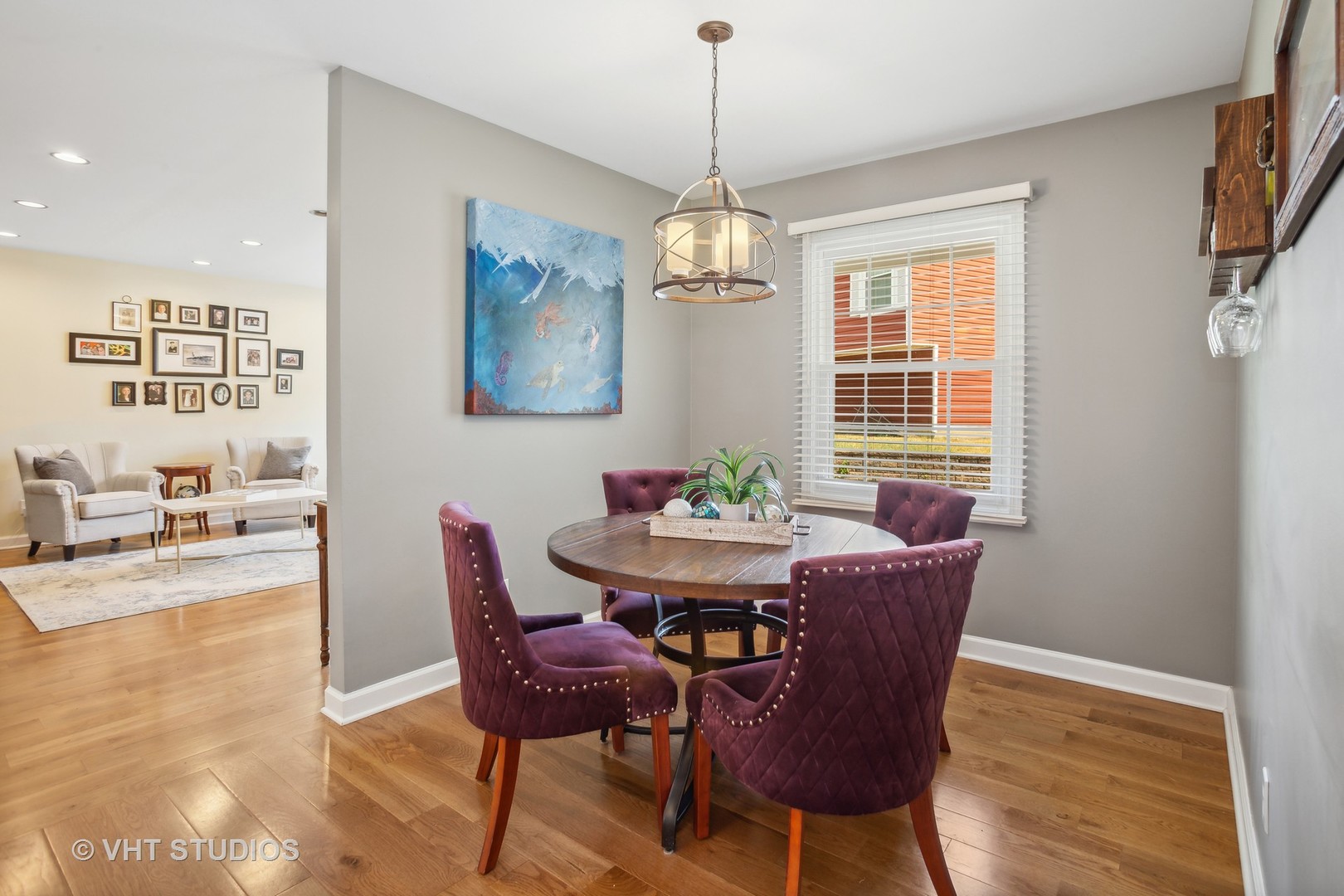 7 Windsor Court Streamwood, IL 60107 - Photo 9 of 22 a view of a dining room with furniture window and wooden floor