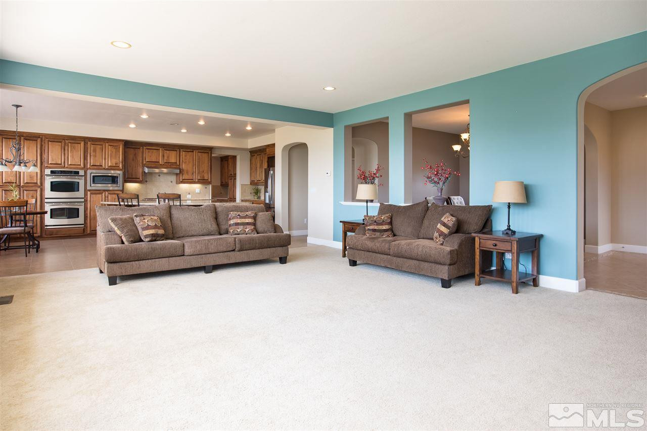 8548 Timaru Trail Reno, NV 89523 - Photo 12 of 25 a living room with furniture and large window