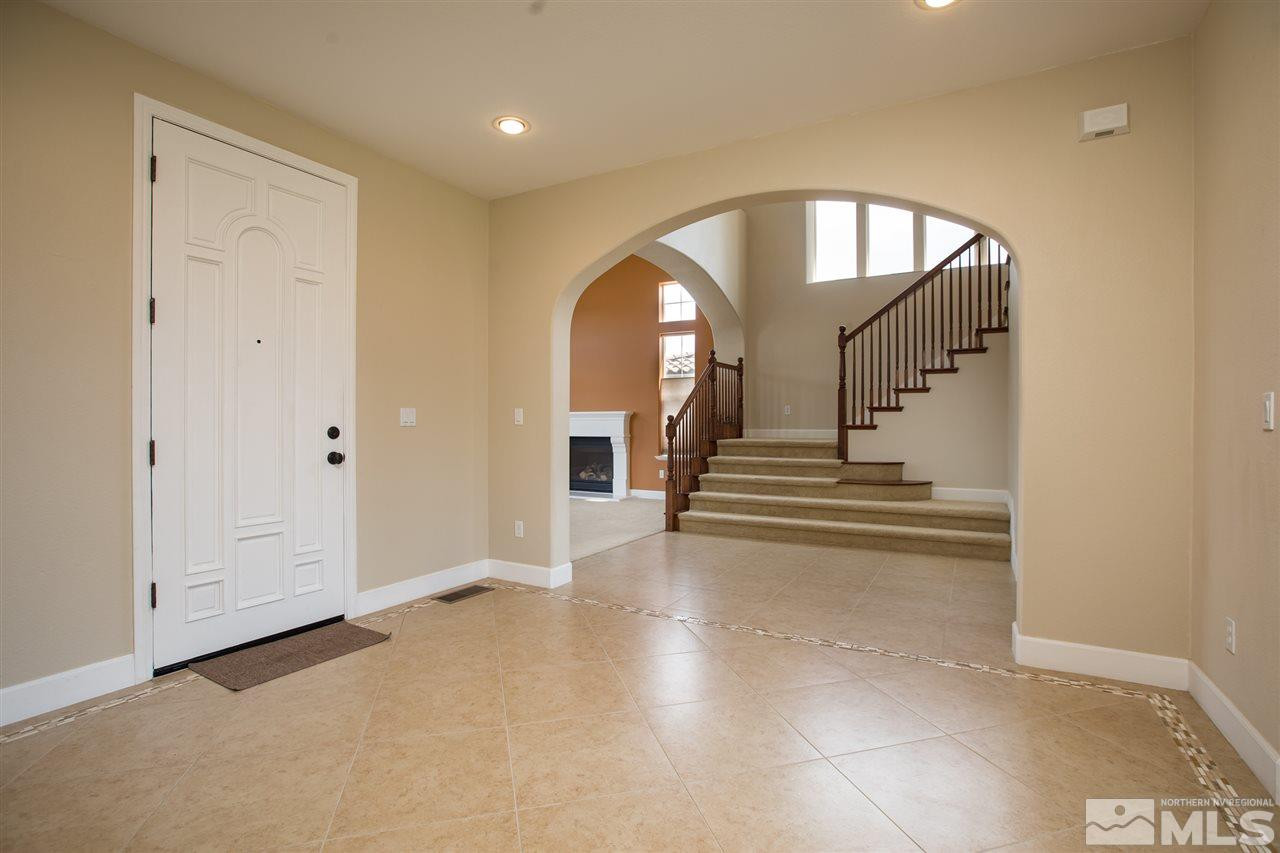 8548 Timaru Trail Reno, NV 89523 - Photo 4 of 25 a view of entryway and hall with wooden floor