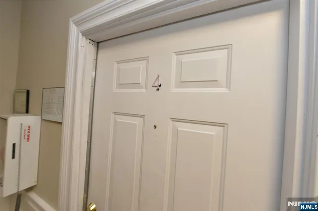 a view of a hallway with closet