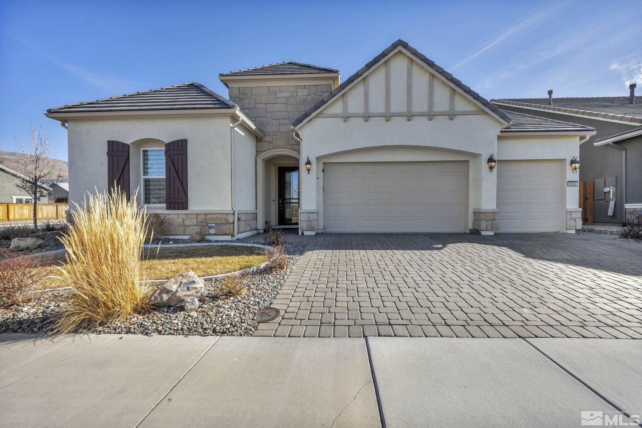 a front view of a house with yard