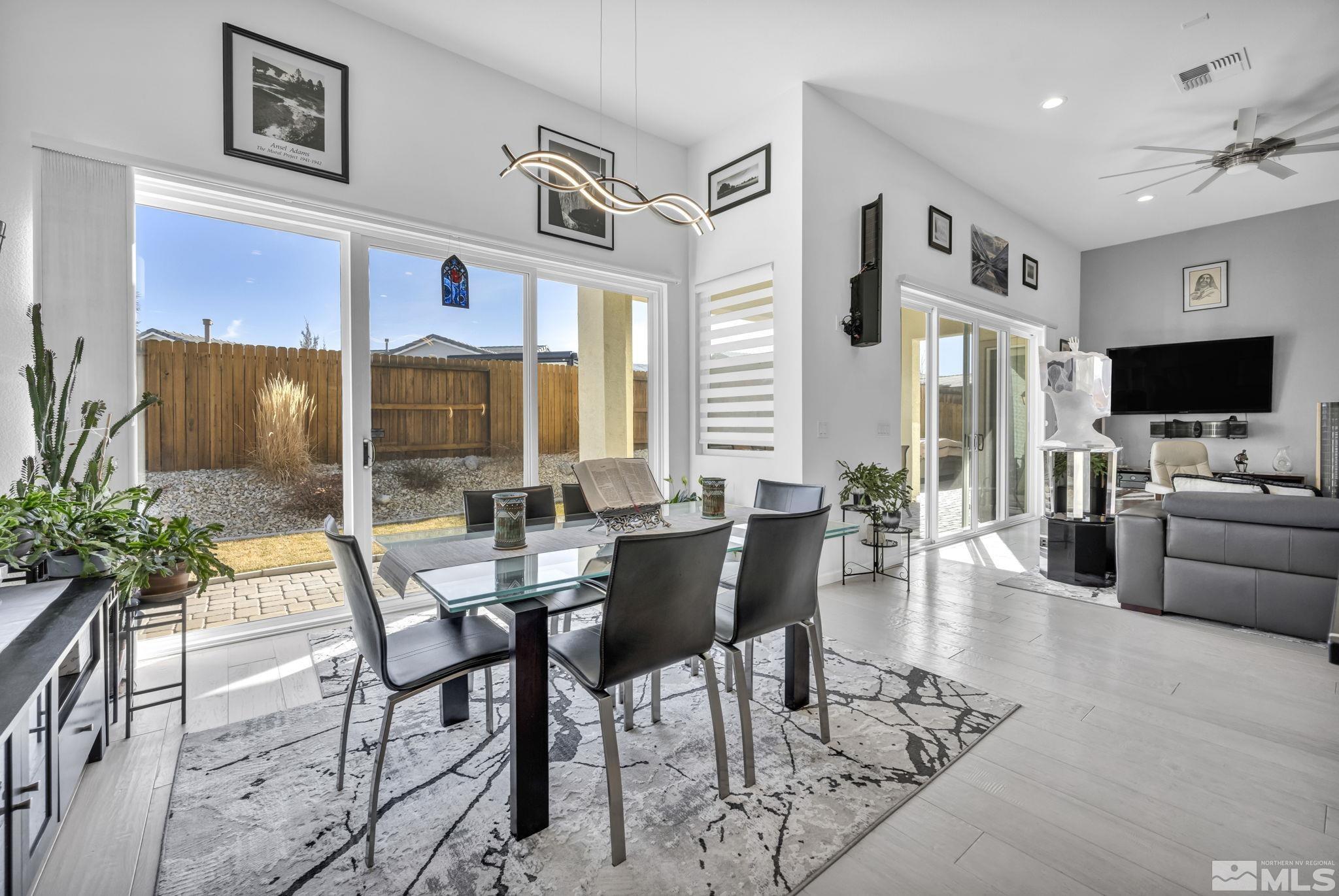 9500 Hawkshead Road Reno, NV 89521 - Photo 11 of 40 a view of a dining room with furniture