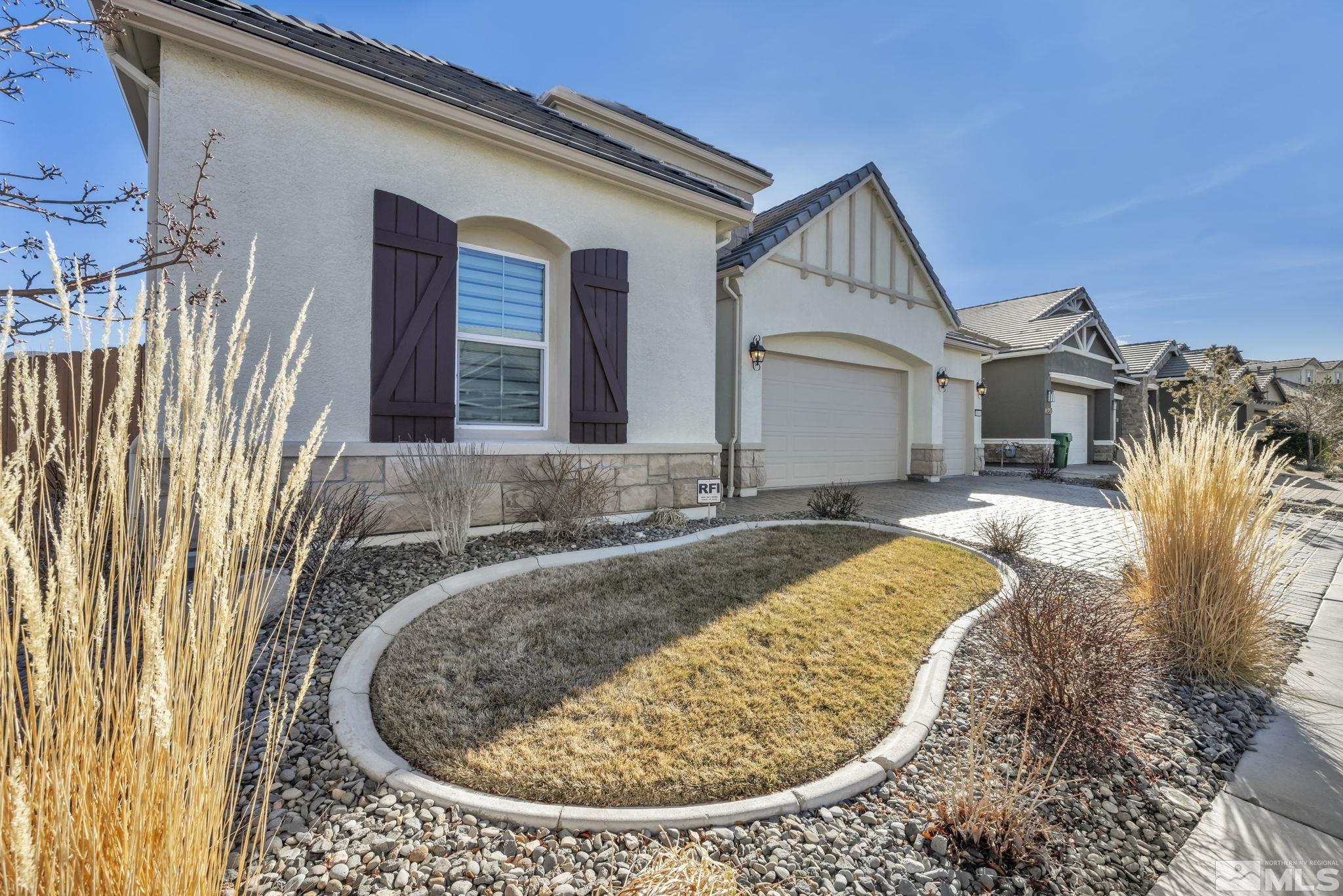 9500 Hawkshead Road Reno, NV 89521 - Photo 3 of 40 a view of a house with a tub