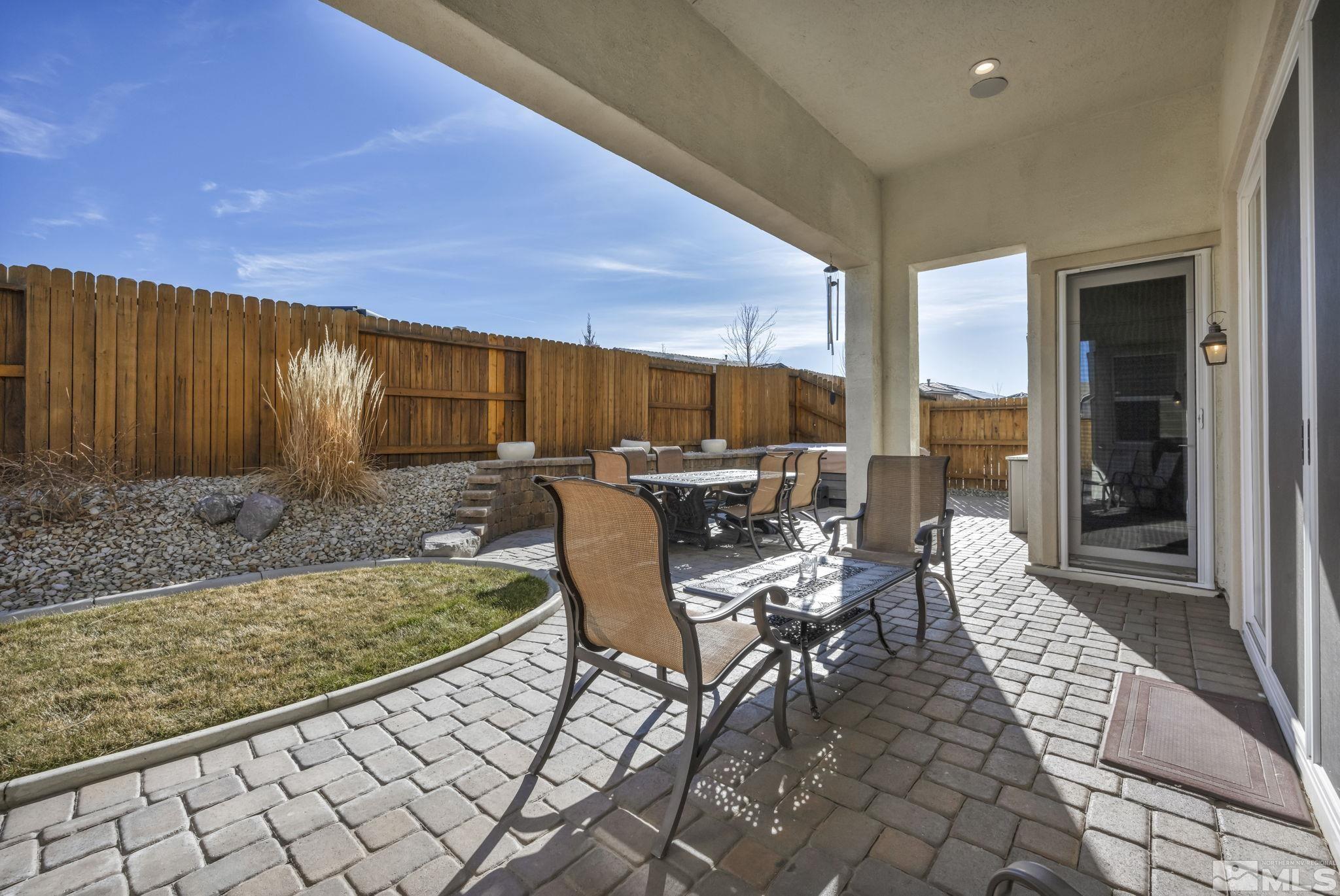 9500 Hawkshead Road Reno, NV 89521 - Photo 31 of 40 a view of a patio with table and chairs