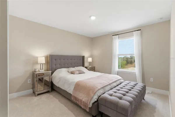 a living room with a couch and a window