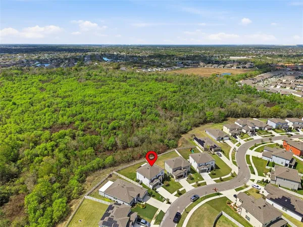 a view of a lake with a yard