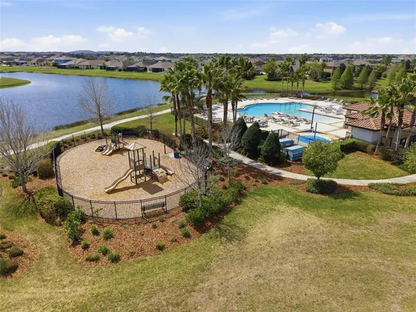 a view of a swimming pool and an ocean view