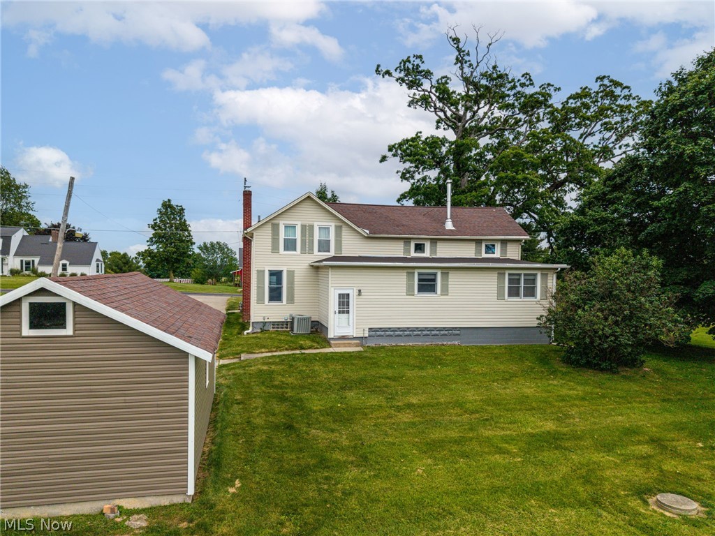 9626 Daniels Road Seville, OH 44273 - Photo 35 of 37 Two-story residence with light-colored siding and a contrasting brown roof