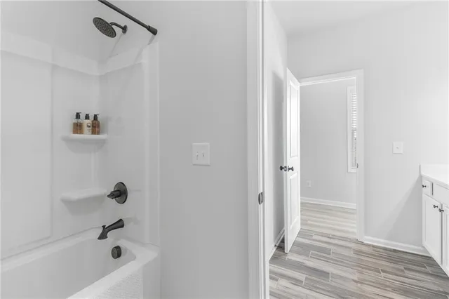 a bathroom with a bathtub