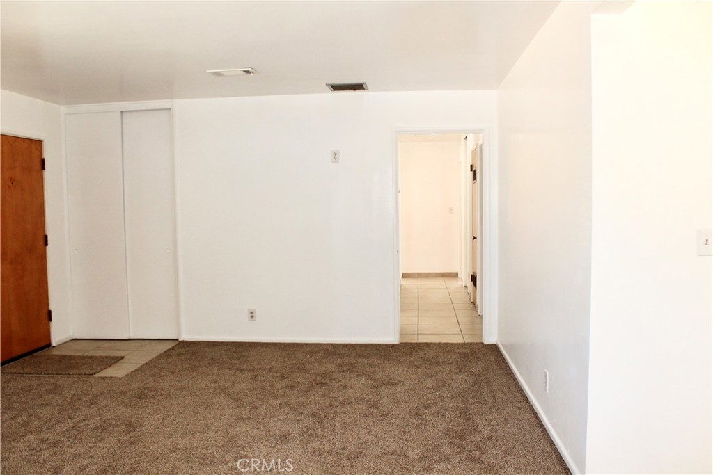15975 Venango Road Apple Valley, CA 92307 - Photo 4 of 23 Living room facing hallway