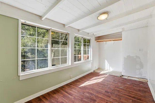 an empty room with windows