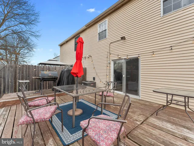 a view of a backyard with furniture