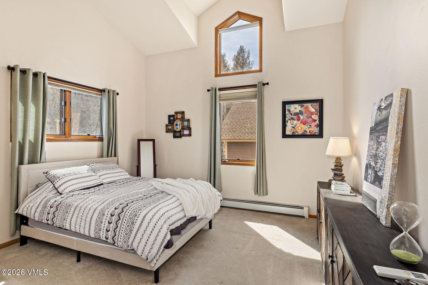 91 Creamery Trail Edwards, CO 81632 - Photo 28 of 44 a bedroom with a bed painting on wall and a window
