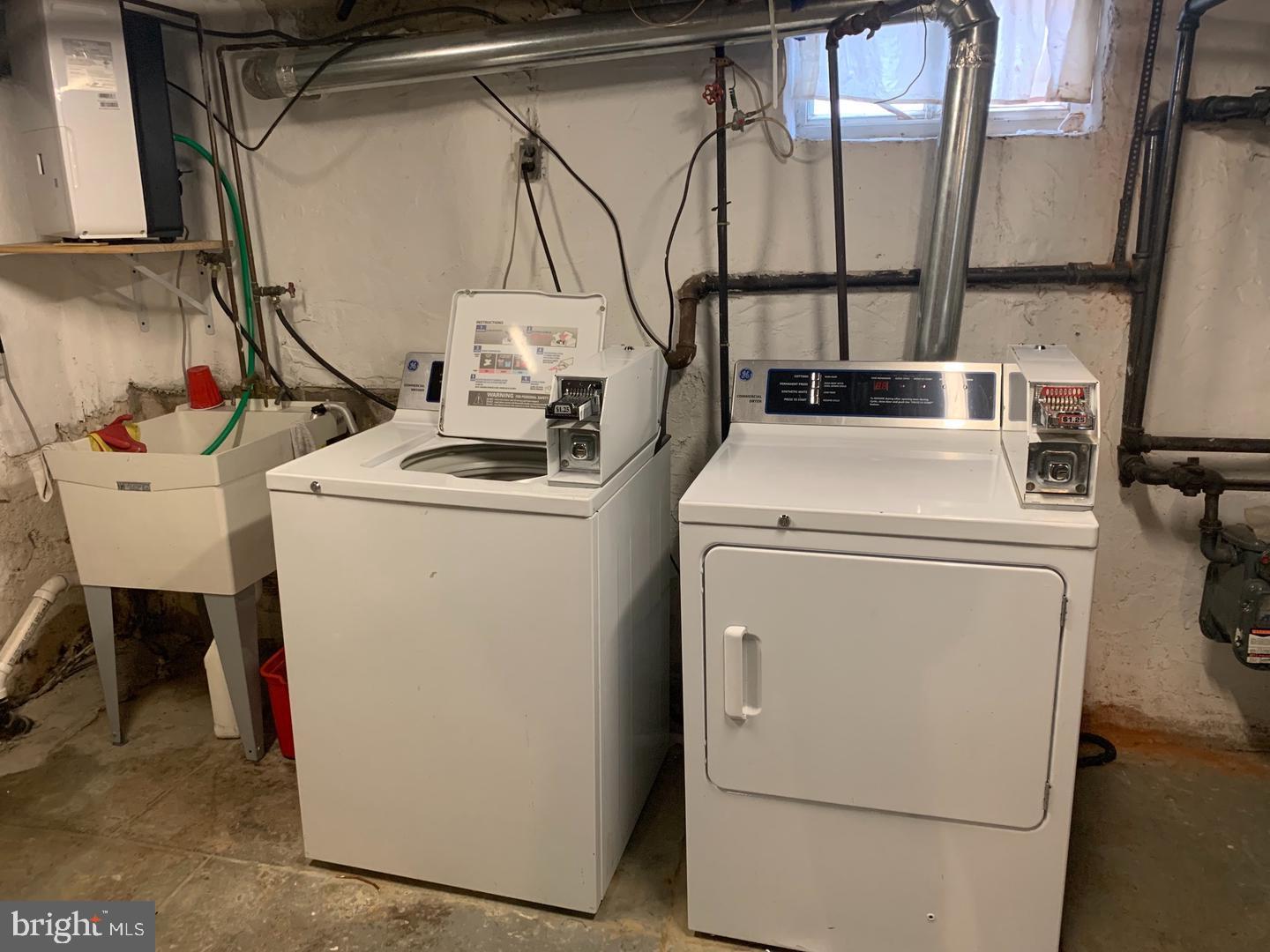 1112 Carpenter Street Philadelphia, PA 19147 - Photo 19 of 19 a utility room with dryer and washer