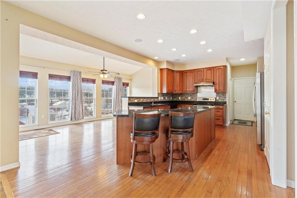 175 Ridge Avenue Pittsburgh, PA 15237 - Photo 3 of 34 Natural light flows into the sunroom, highlighting the light & bright kitchen!