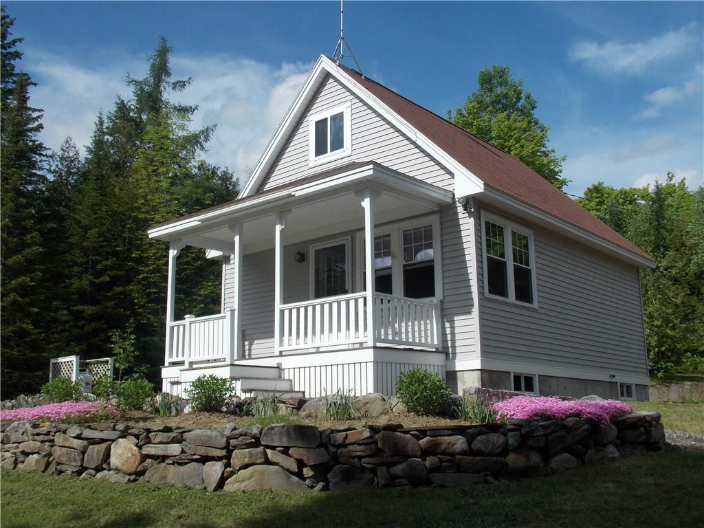 85 Bagley Road Parkman, ME 04443 - Photo 1 of 29 Summer_back of house