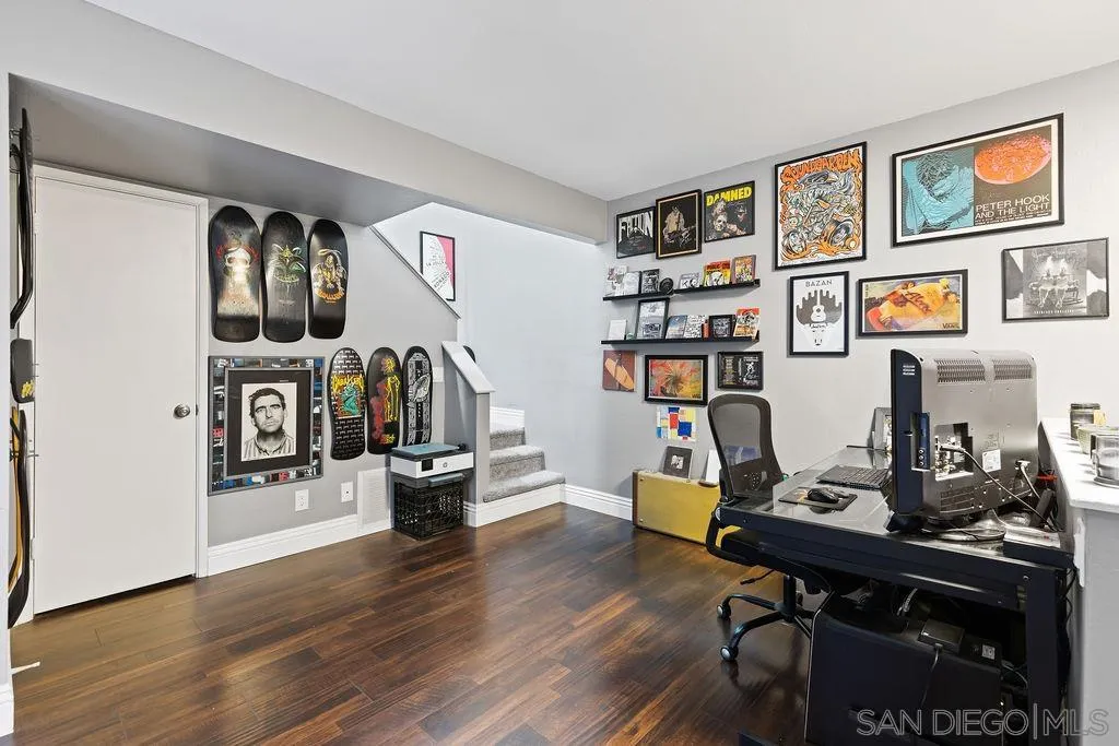 1570 Linwood Street San Diego, CA 92103 - Photo 13 of 36 a view of a workspace with furniture and wooden floor