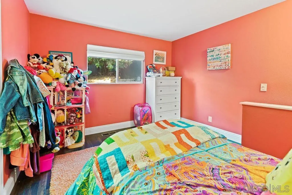 1570 Linwood Street San Diego, CA 92103 - Photo 25 of 36 a bedroom with a bed and a bed