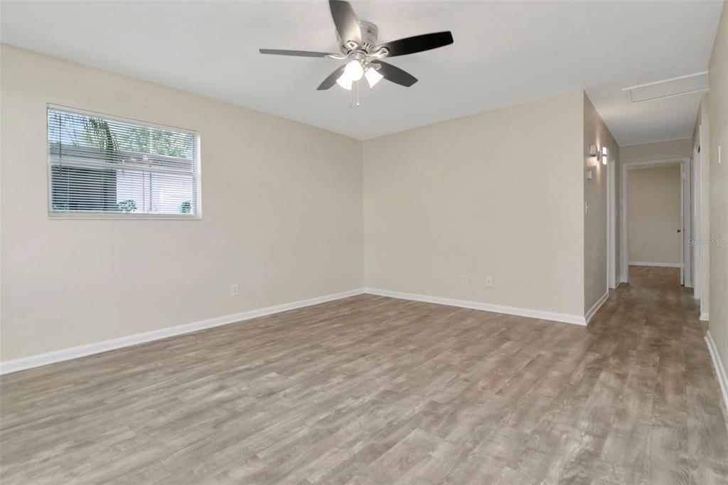 126 Kingsway Road Brandon, FL 33510 - Photo 11 of 42 wooden floor in an empty room
