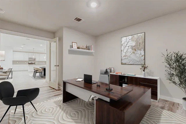 a living room with furniture and a couch