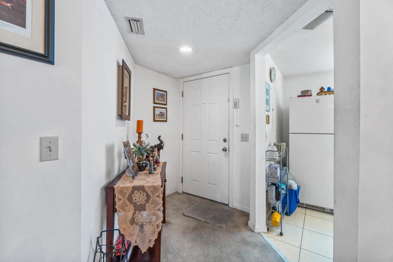 5300 Elmhurst Road, Unit E West Palm Beach, FL 33417 - Photo 2 of 31 004-5300ElmhurstRoad-E-WestPalmBeach-FL-
