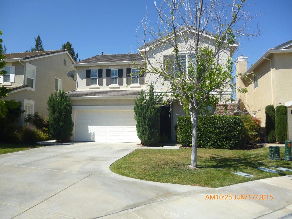 33427 Decada Street Temecula, CA 92592 - Photo 1 of 1 a front view of a house with a yard