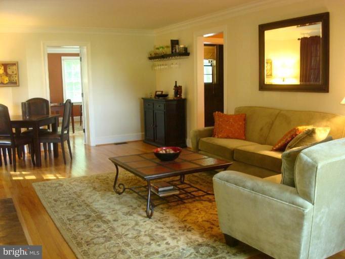 13603 Bardon Road Phoenix, MD 21131 - Photo 11 of 30 a living room with furniture and a table