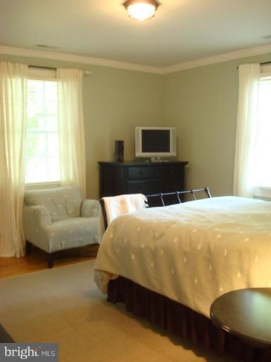 13603 Bardon Road Phoenix, MD 21131 - Photo 15 of 30 a bedroom with a bed and a couch