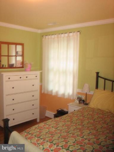 13603 Bardon Road Phoenix, MD 21131 - Photo 16 of 30 a bedroom with a bed and a window