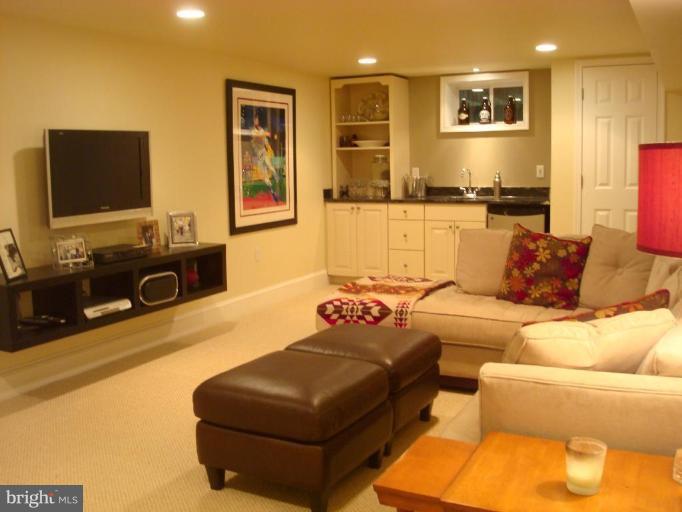 13603 Bardon Road Phoenix, MD 21131 - Photo 19 of 30 a living room with furniture and a flat screen tv