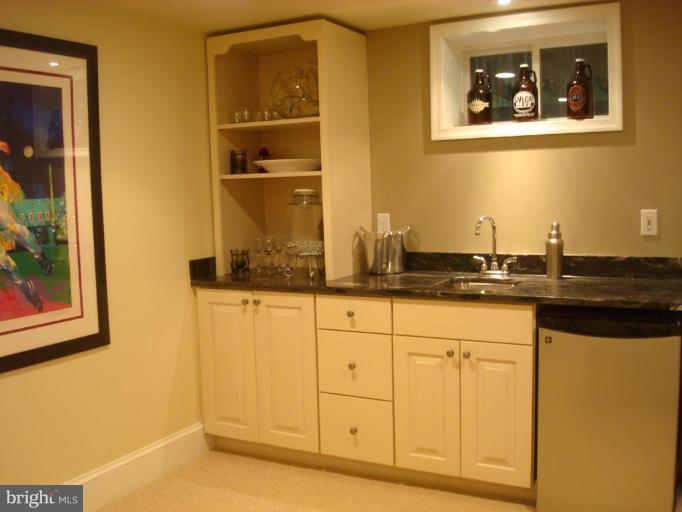 13603 Bardon Road Phoenix, MD 21131 - Photo 21 of 30 a bathroom with a sink and a mirror
