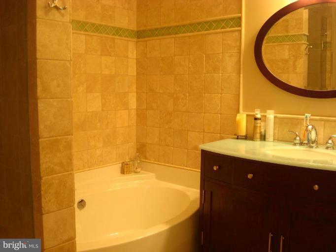 13603 Bardon Road Phoenix, MD 21131 - Photo 23 of 30 a bathroom with a sink and a mirror