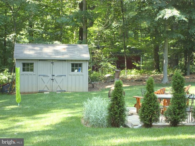 13603 Bardon Road Phoenix, MD 21131 - Photo 25 of 30 a view of a back yard of the house