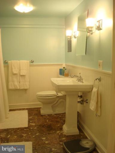 13603 Bardon Road Phoenix, MD 21131 - Photo 29 of 30 a bathroom with a sink a toilet and mirror