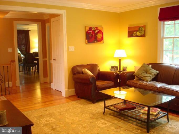 13603 Bardon Road Phoenix, MD 21131 - Photo 9 of 30 a living room with furniture and a table