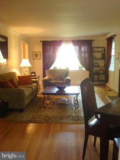 13603 Bardon Road Phoenix, MD 21131 - Photo 10 of 30 a living room with furniture and a table