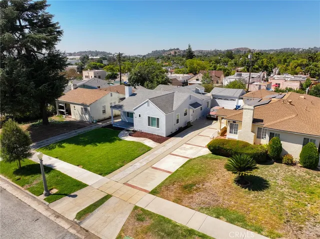 a aerial view of a house with garden