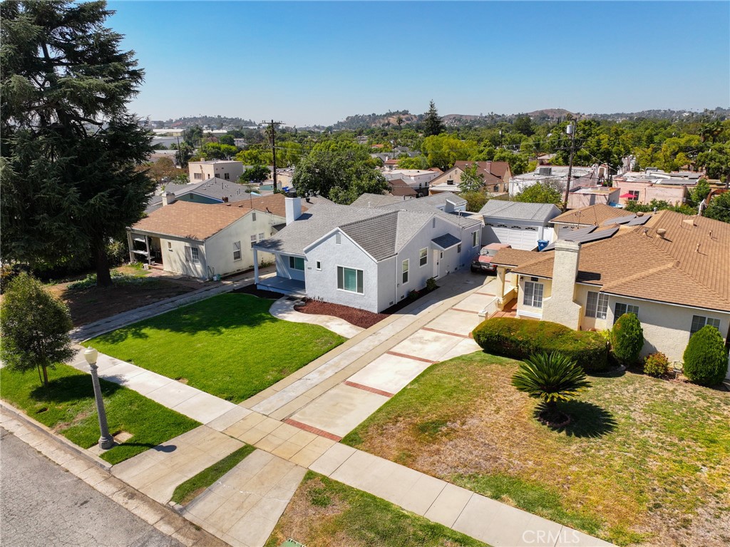 a aerial view of a house with garden